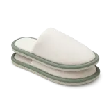 A pair of hotel slippers
