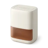 A white dehumidifier with its water tank