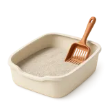 A clean litter tray and its scoop